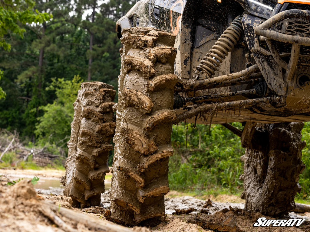 Assassinator tires caked in mud.