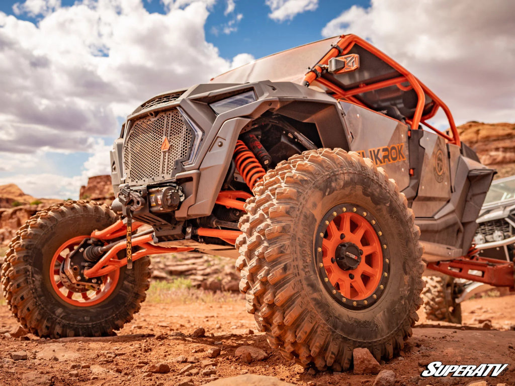 SuperATV tires on a UTV in the desert.