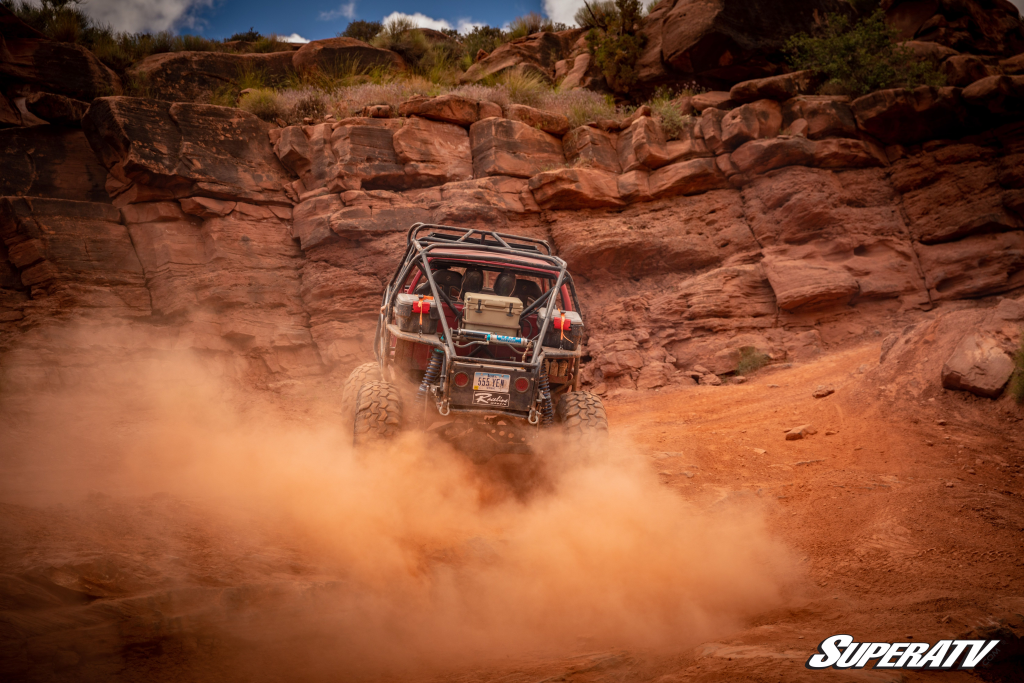 A UTV riding through the desert.