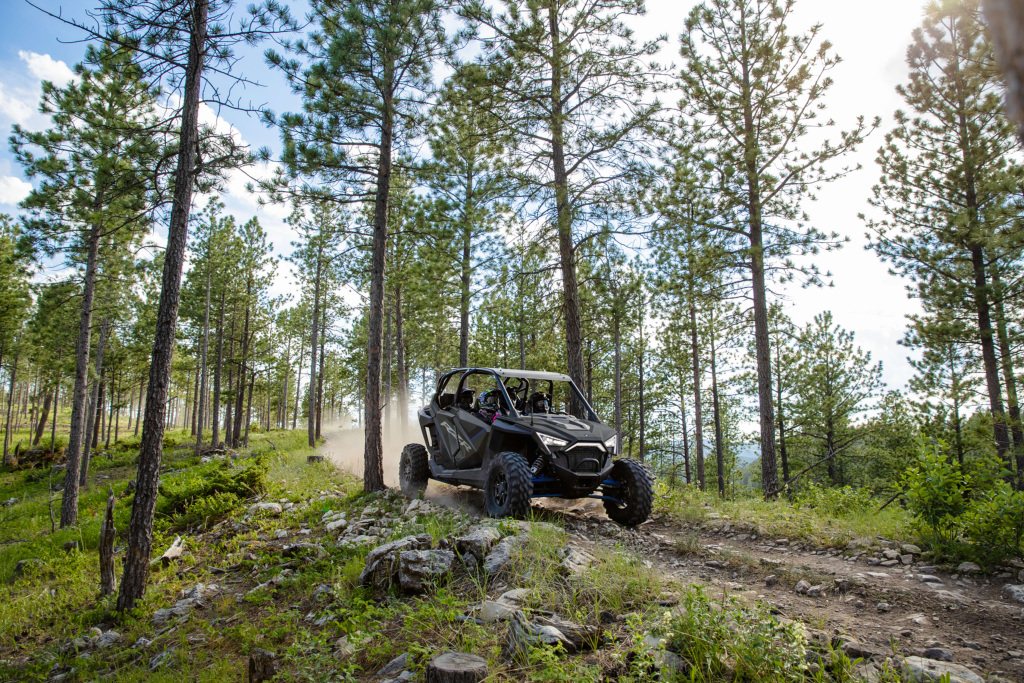A UTV riding through Emily-Outing ATV Trail System.