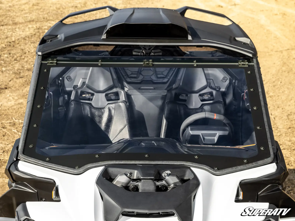 A SuperATV Flip Windshield on a Can-Am Maverick R.