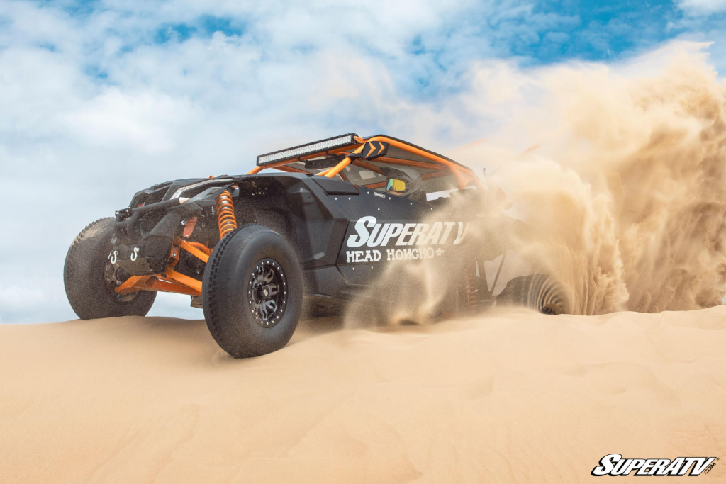 A UTV riding through the desert.