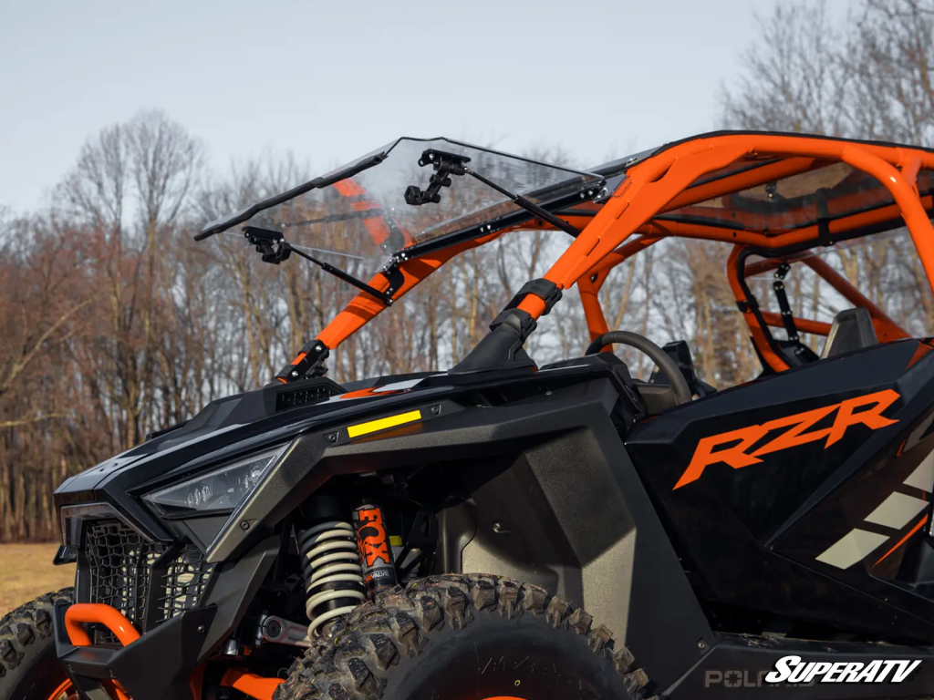 A SuperATV flip windshield on a Polaris RZR Pro R
