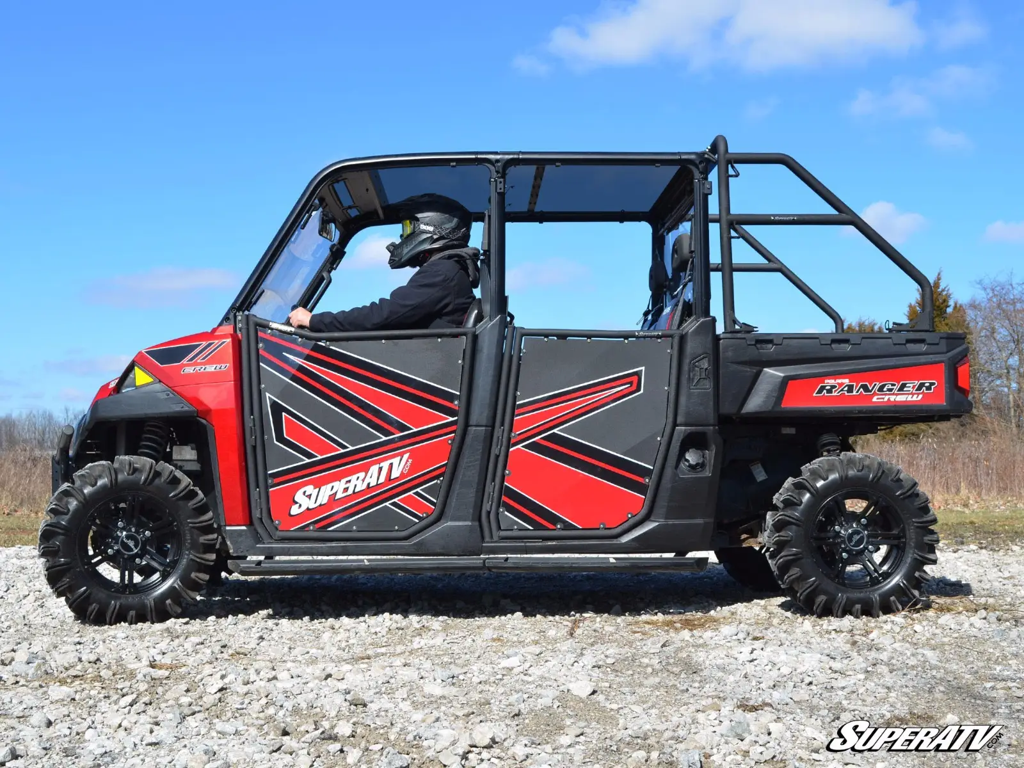 A ranger xp 1000 crew with aluminum doors and a custom superatv graphic