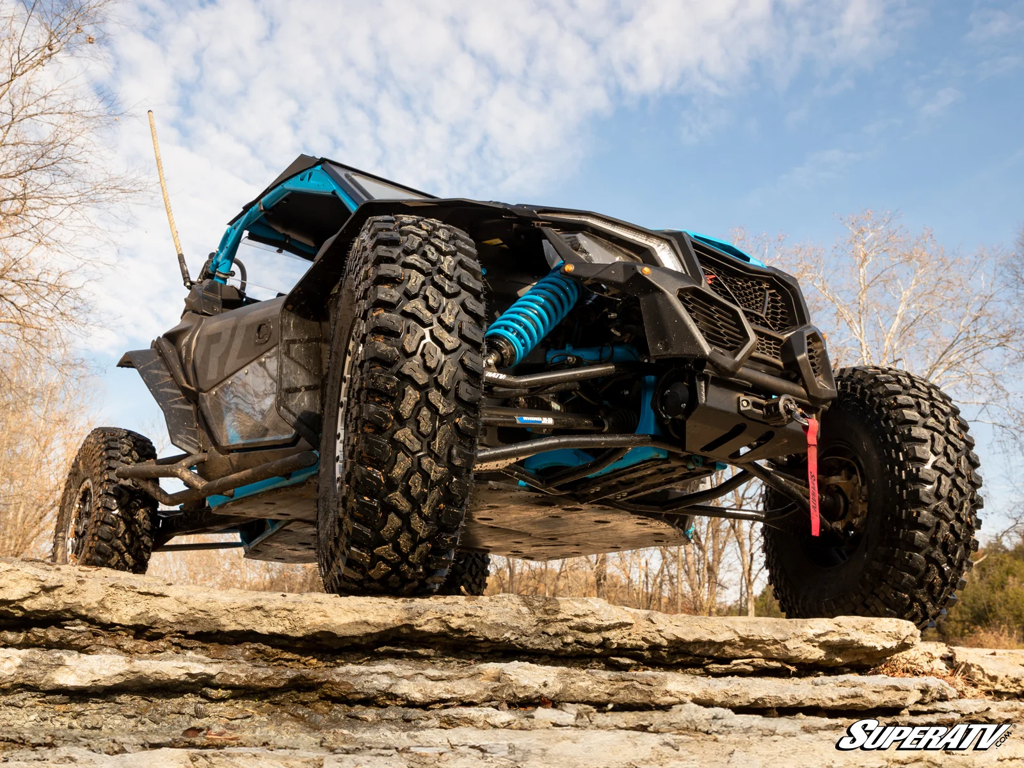 A Maverick X3 on a rock showing off Incursion tire tread