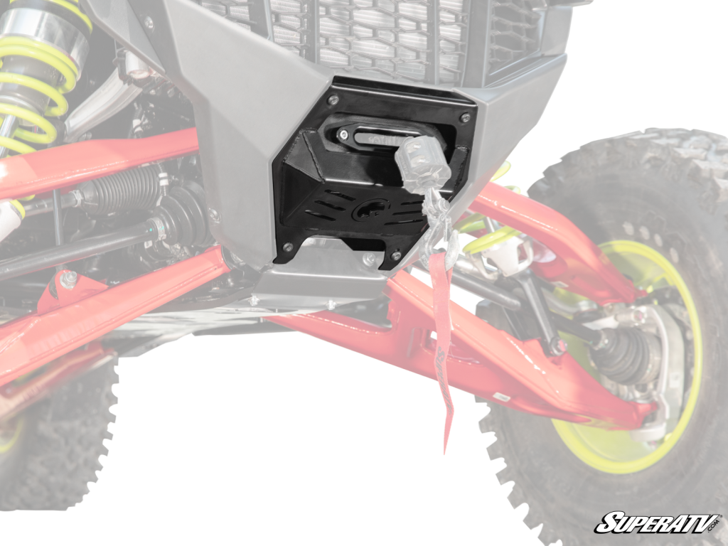A closeup shot of a RZR Pro R with a winch mount on the front.