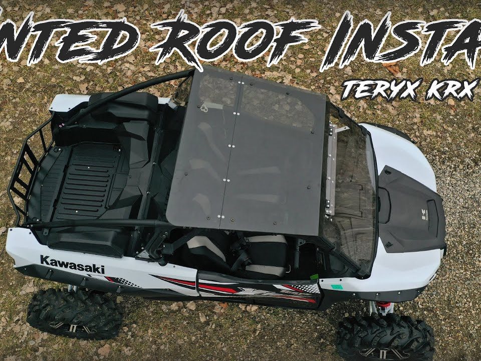 A kawasaki teryx KRX 1000 with a SuperATV tinted roof installed