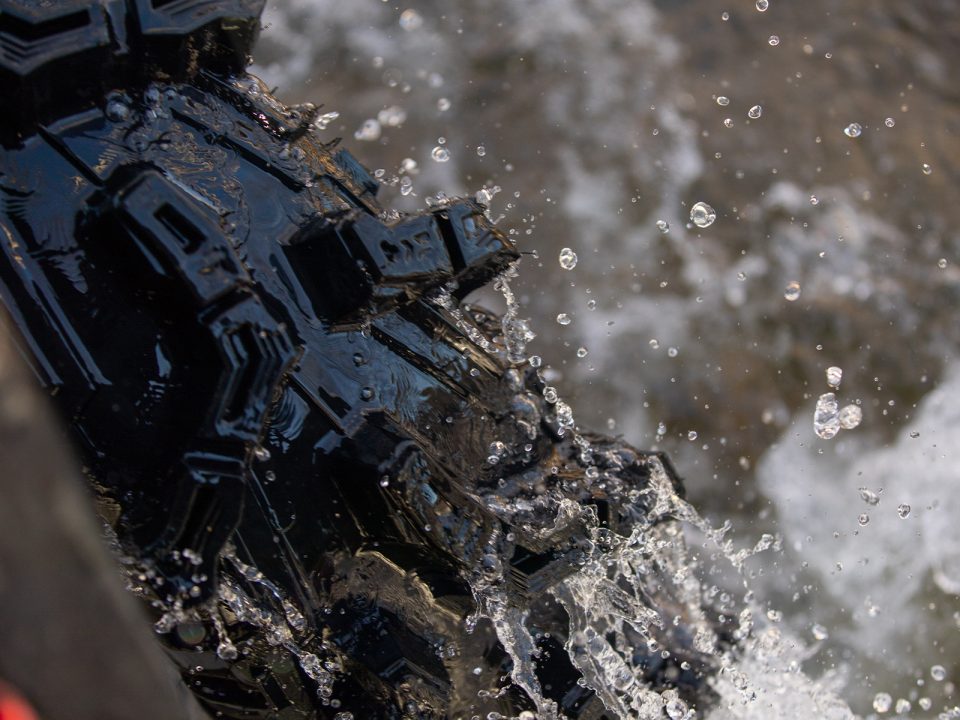 Up close shot of Terminator Tires going through water