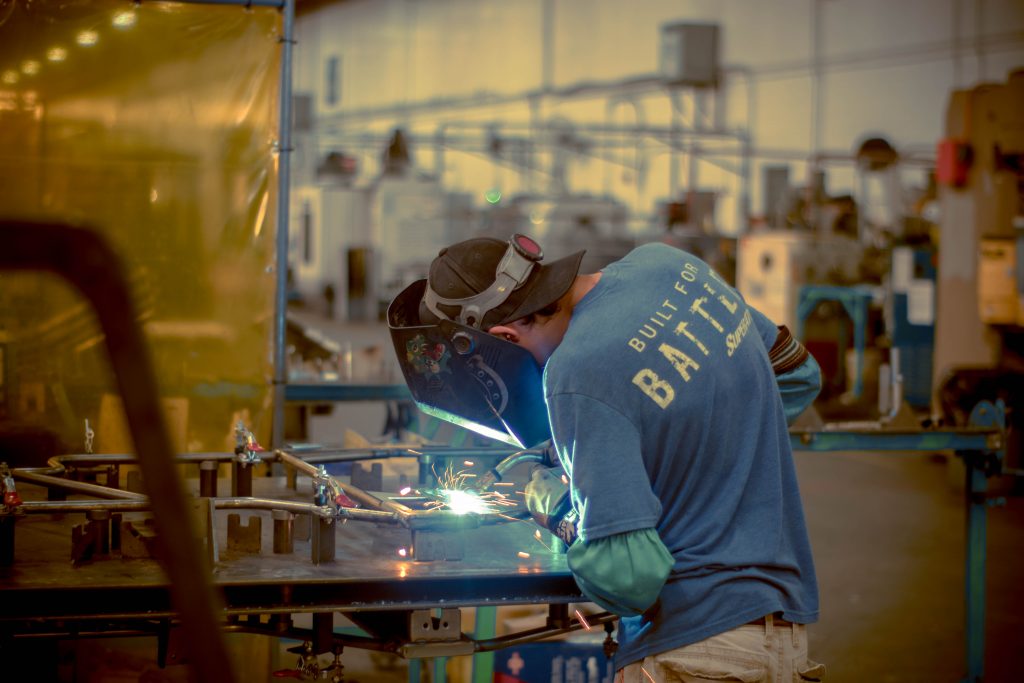 SuperATV employee welding